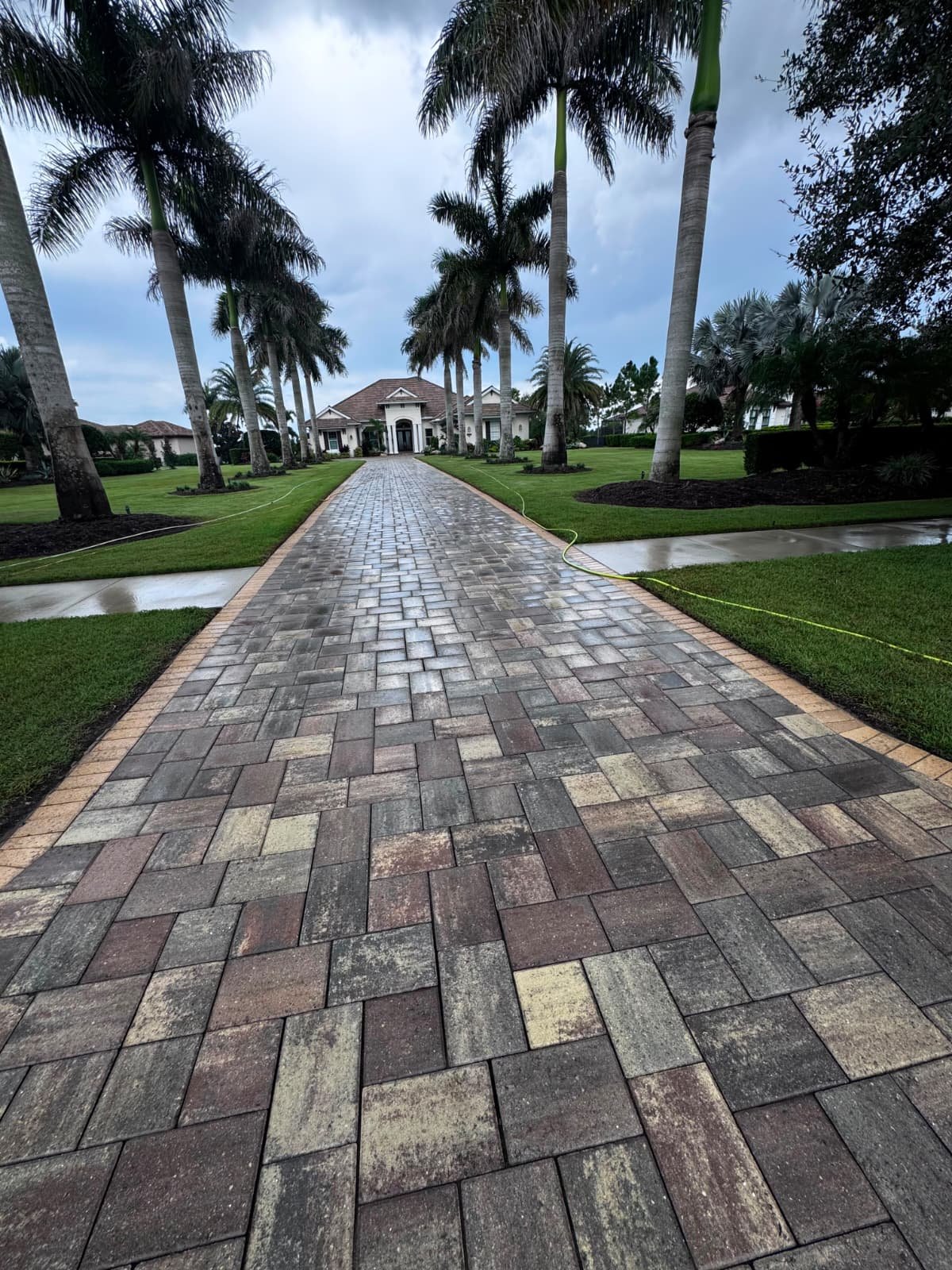 Completed driveway cleaning and sealing in Sarasota and Manatee County Florida